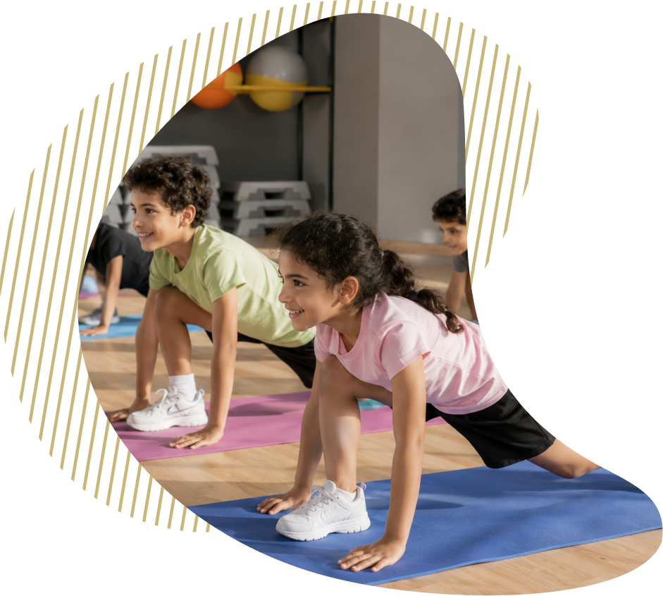 A kids' class working through a floor sequence